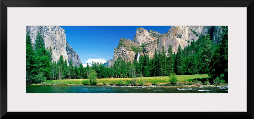 Wall art for the home or office a panoramic landscape photograph of a river and meadow in the Yosemite Valley in the summer.