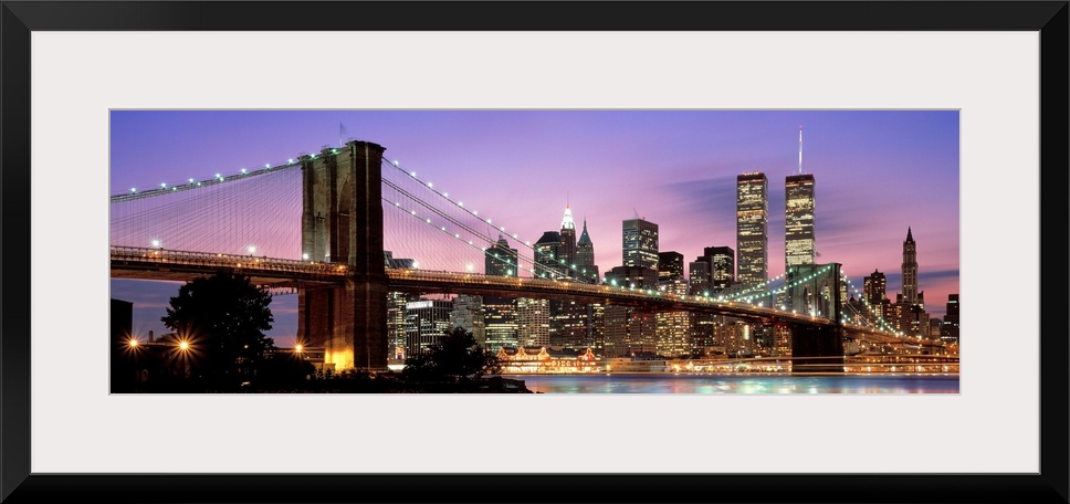 This large wall art has a dominating sky at twilight giving a panoramic view of lower Manhattan and Brooklyn Bridge before...