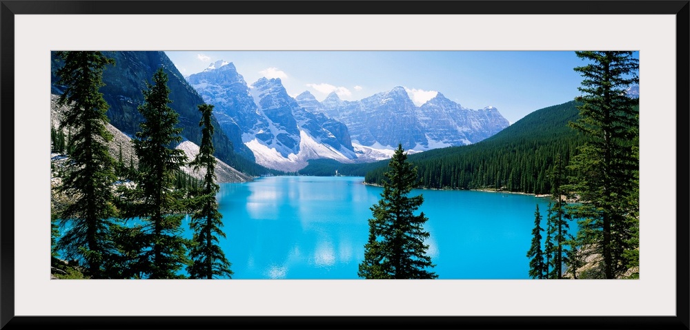 Panoramic photograph of the Valley of Ten Peaks that is located on Moraine Lake within Banff National Park in Alberta, Can...