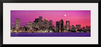 Massachusetts, Boston, View of an urban skyline by the shore at night