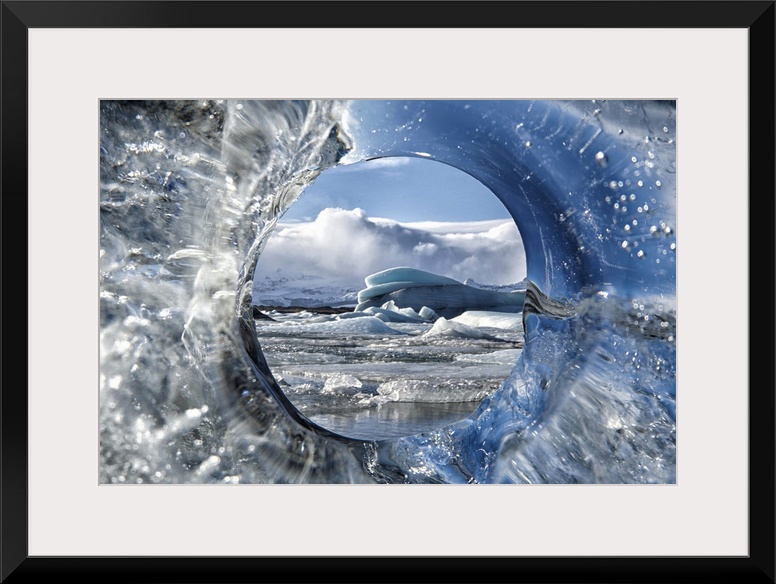 Looking through a hole of ice from a glacier.