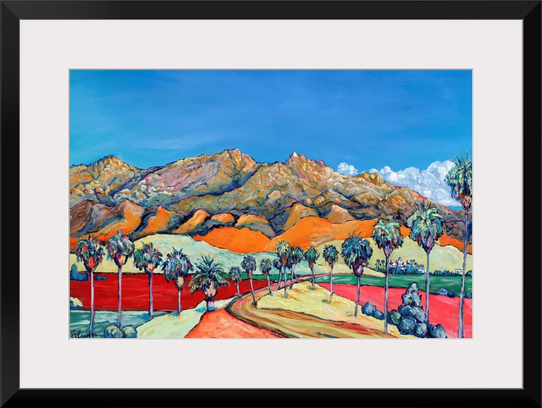San Diego desert in exciting bright and bold colors. Blue skies and swaths of color, rugged mountains with a Palm tree lin...