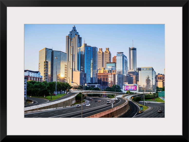 Morning sunlight reaching the skyscrapers of Atlanta, Georgia, see from the freeway.