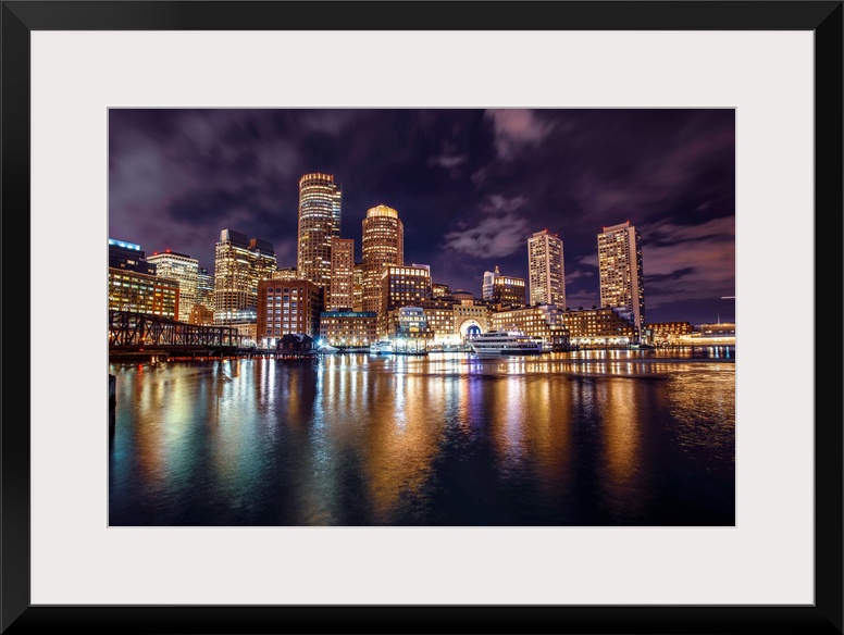 Photo of Boston city skyline and waterfront from the view of the Harborwalk.