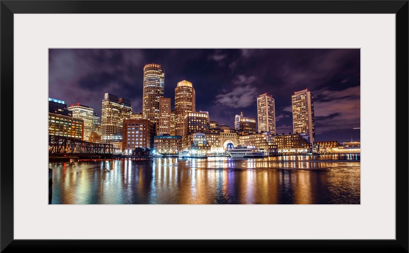 Photo of Boston city skyline and waterfront from the view of the Harborwalk.