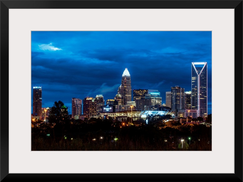 Horizontal image of the city of Charlotte, North Carolina at night.