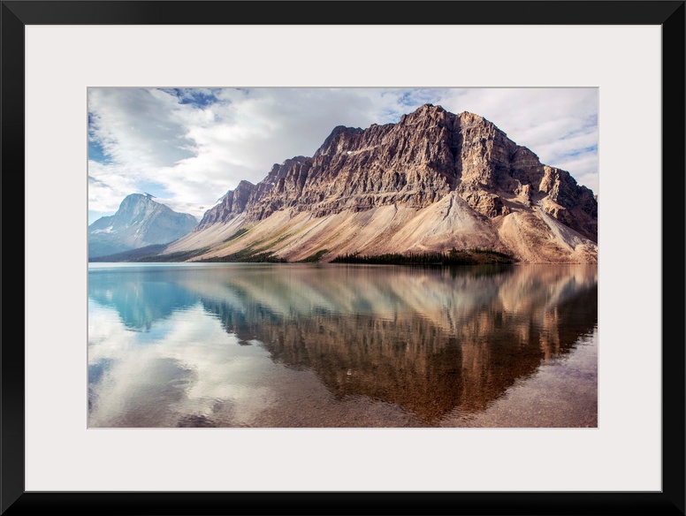 Crowfoot Mountain reflected in Bow Lake located in Banff National Park, Alberta, Canada.