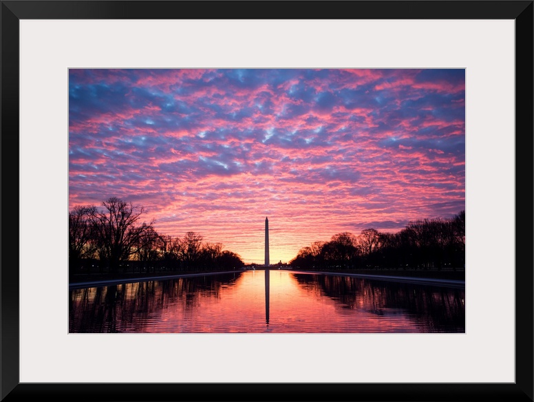 Vibrant clouds at sunset over the Washington Monument on the National Mall in Washington, DC.