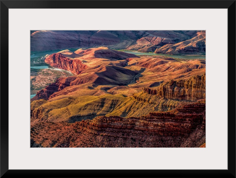 Landscape photograph of the Colorado River winding through the Grand Canyon.