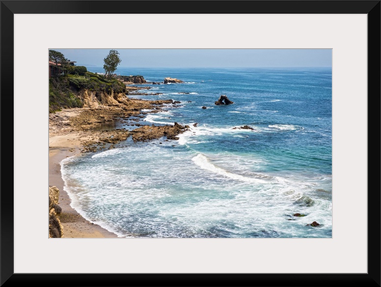 Little Corona del Mar beach is relatively small, flanked on both sides with rocky reefs.