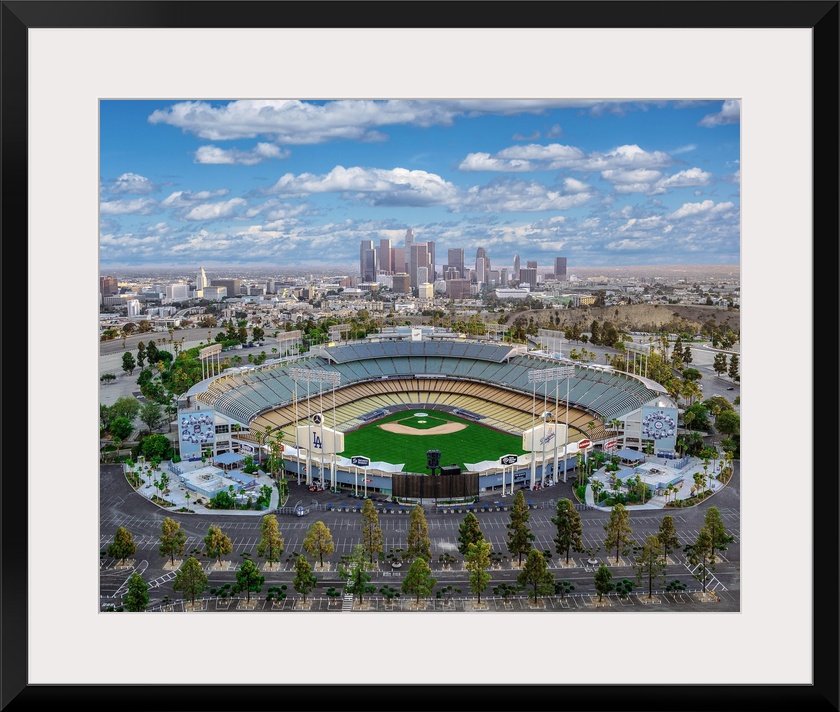 Aerial view of the Dodger Stadium with the Los Angeles skyline in the distance, California.