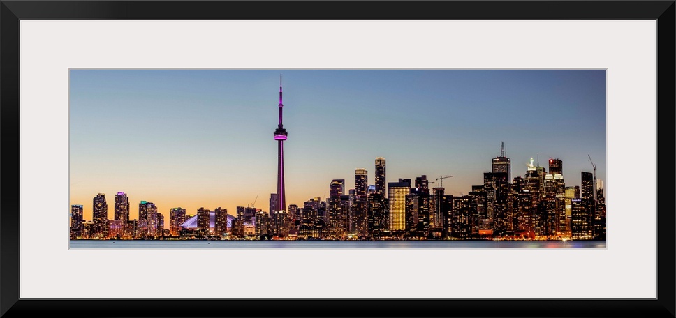 Photo of Toronto city skyline at night, Ontario, Canada.