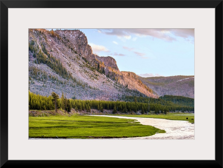 River flowing along the mountains in Yellowstone National Park in Wyoming.