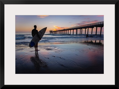 Scripps Beach Pier and Surfer Silhouette at Sunset, La Jolla, San Diego