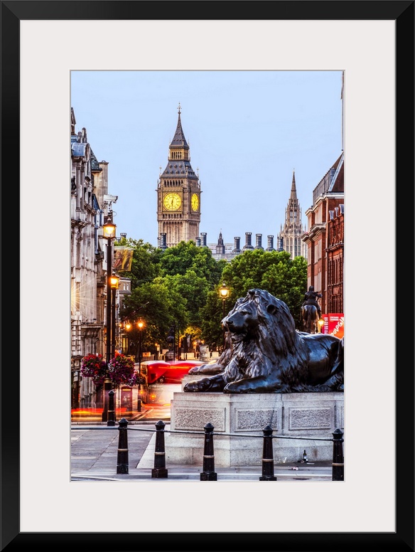 Photograph of Trafalgar Square with the iconic Trafalgar Lions in the foreground and Big Ben in the background.