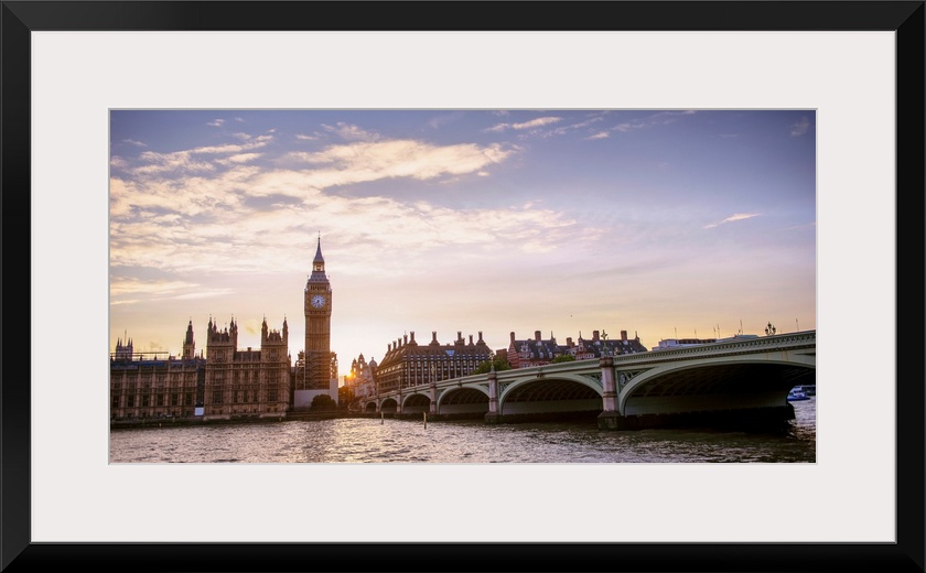 Panoramic photograph of the Westminster Bridge over the River Thames with Big Ben in the background at sunset, Westminster...