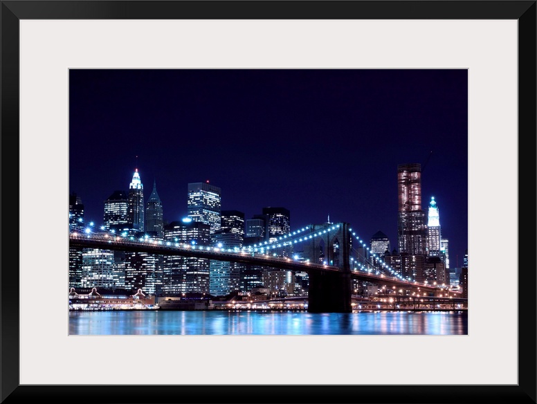 Brooklyn Bridge and Manhattan Skyline At Night, New York City.