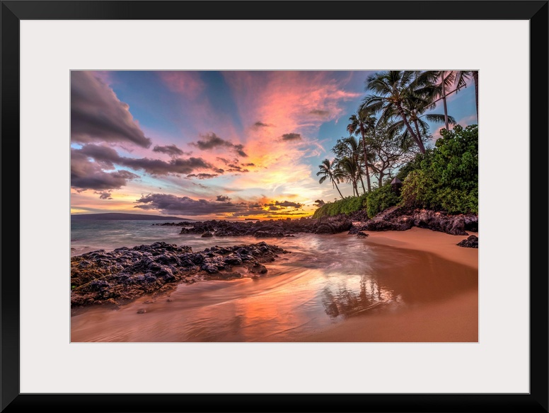 Colorful sunset from secret cove, Maui, Hawaii.