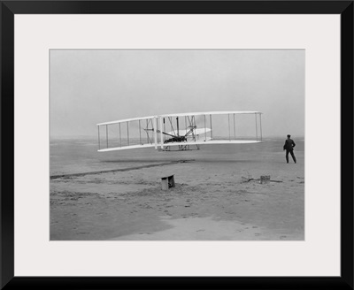 The first flight of the Wright Flyer in 1903