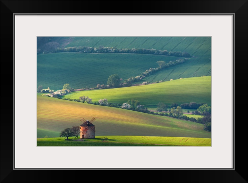 Rural Summer Landscape With Old Windmill And White Flowering Trees.
Beautiful Sunset Above The Ancient Windmill On The Gr...