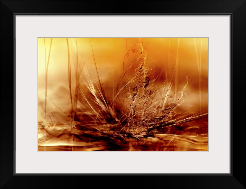 Abstract orange, yellow, and red photograph using water and grass to resemble fire and movement.