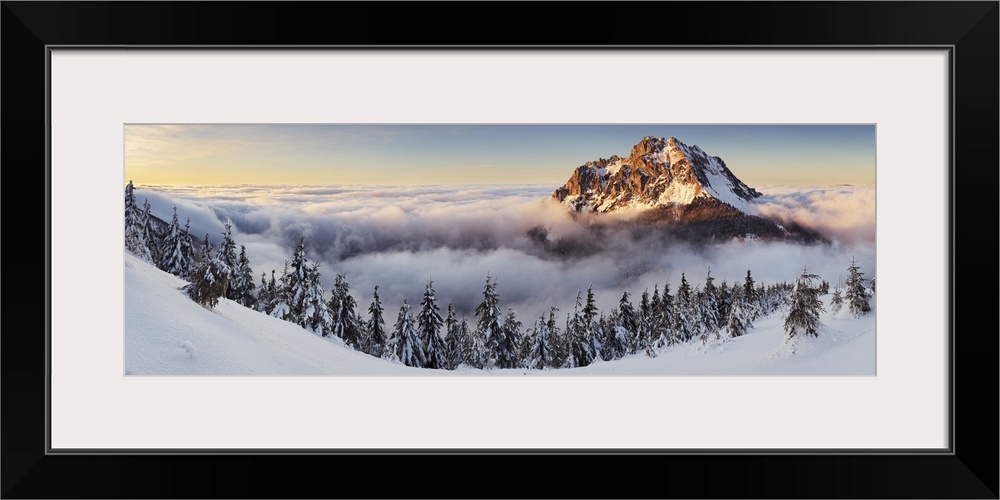 Panorama of Rozsutec in the clouds at sunset, Mala Fatra, Slovakia.