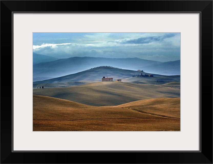 Farmhouse in the middle of the country landscape, Tuscany.