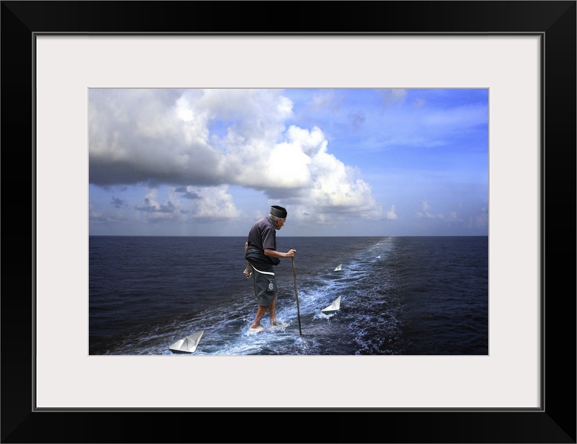 Elderly man walking on the ocean with paper boats guiding the way.