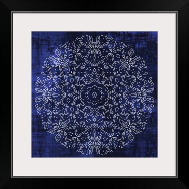 A white symmetrical geometric mandala on an indigo background.