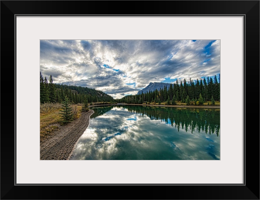 Reflective and picturesque Cascade Ponds just outside of Banff, in Banff National Park, Canadian Rockies, Alberta, Canada.