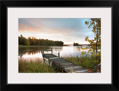 A Dock On A Lake At Sunrise Near Wawa; Ontario, Canada