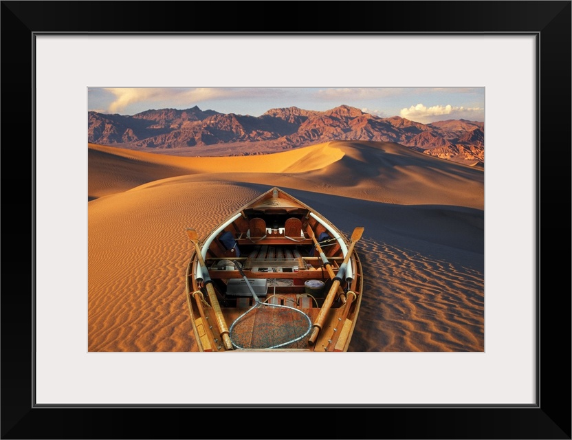 Drift boat and Death Valley National Park sand dunes. Composite.