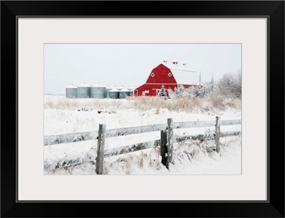 Farm Yard With A Red Barn And Metal Grain Bins In Winter, Alberta, Canada
