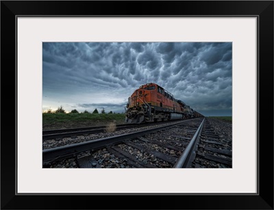 Freight Train With Mammatus Clouds Overhead While On A Storm Chasing Tour, Oklahoma, USA