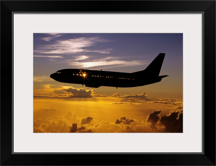 Hawaii, Airplane In Silhouette Sunset In Sky