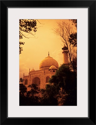 India, Taj Mahal At Dusk, Orange Skies And Dark Trees