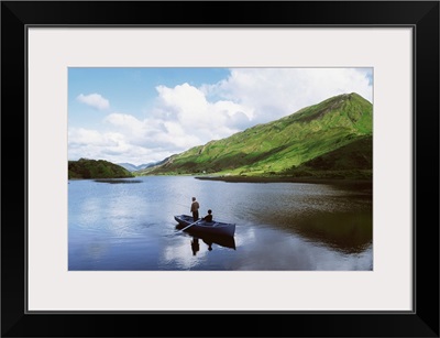Kylemore Lake, Co Galway, Ireland; People Fishing On A Lake