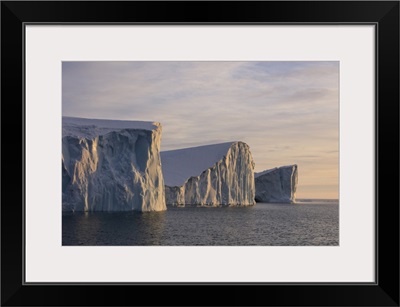 Late Afternoon Sunlight On Icebergs In Disko Bay