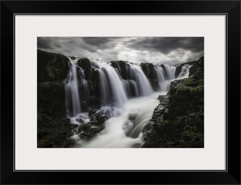 Moody image of waterfalls in the central area of Iceland in a long exposure, Iceland.