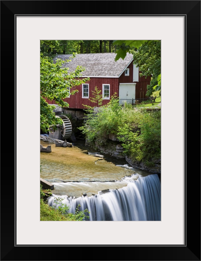 Red Barn With A Mill Wheel And Waterfall; Thorold, Ontario, Canada