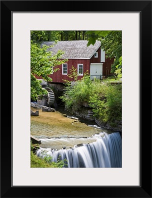 Red Barn With A Mill Wheel And Waterfall; Thorold, Ontario, Canada