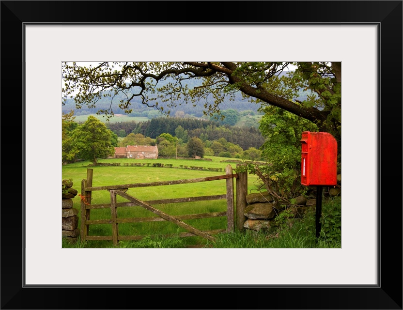 Red Mailbox In Rural Setting, North Yorkshire, England, UK