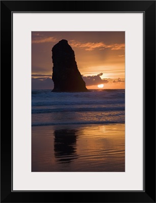 Silhouette Of A Rock Formation At Sunset; Cannon Beach, Oregon, USA