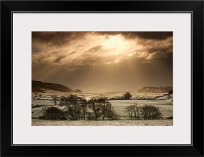 Sun Shining Over Sepia-Toned Winter Landscape, North Yorkshire, England