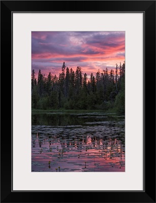 Sunset over a small beaver pond along the Yellowhead Highway near Smithers, Canada