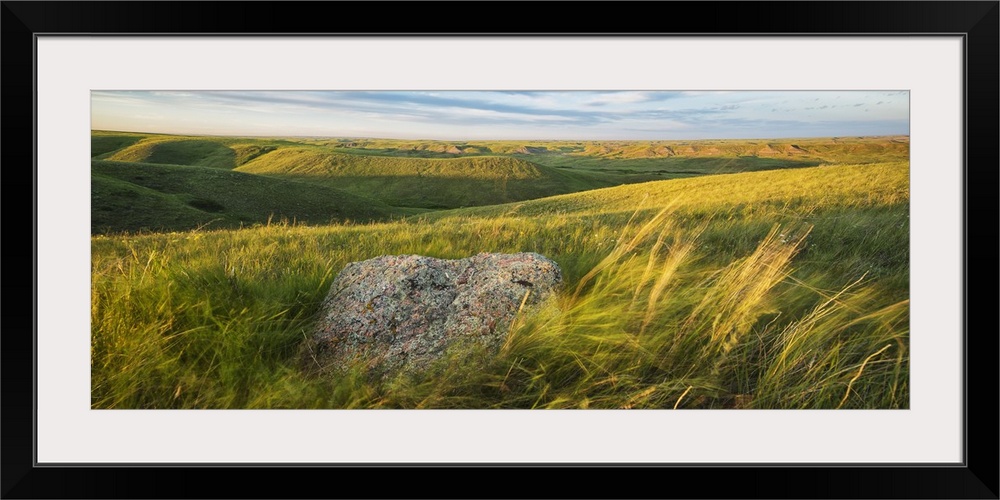 Sunset Over The Coulees And Buttes Of Grasslands National Park With Erratic In Foreground; Saskatchewan, Canada