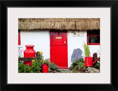 Traditional Irish Cottage With A Red Door And Red Decorative Items, Currabinny, Ireland