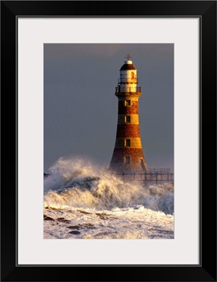 Waves Crashing Against A Lighthouse, Tyne And Wear, England