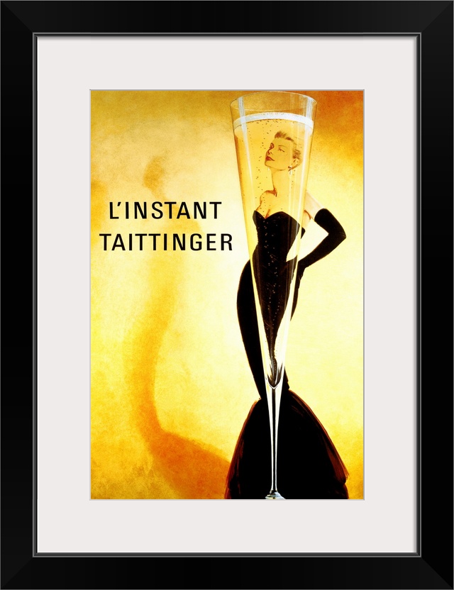 Big print of a slender champagne filled glass with a woman posing seen through it.