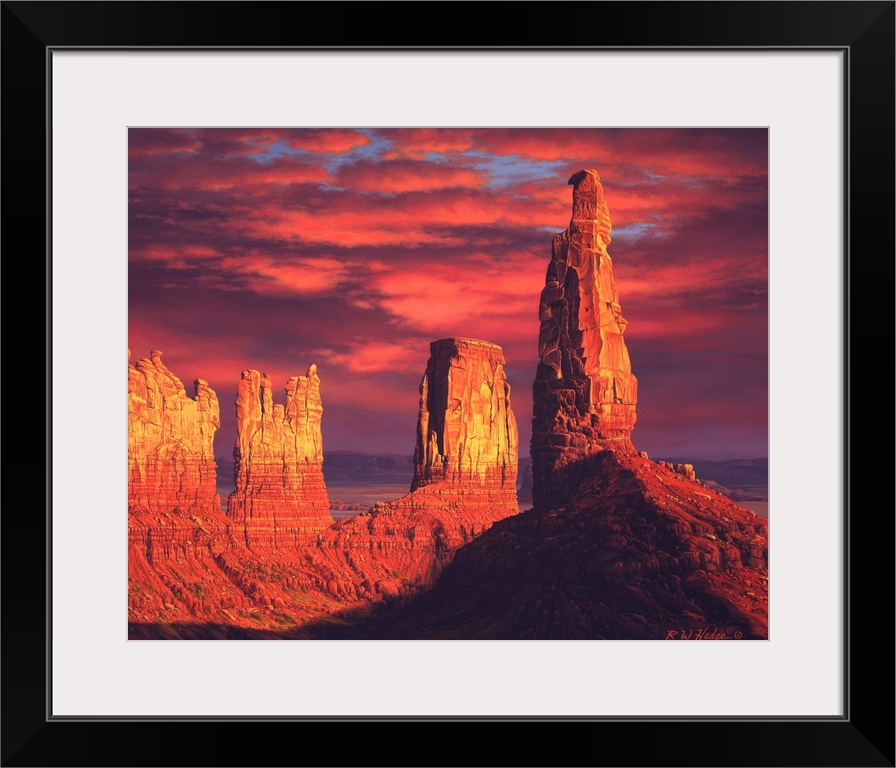 The sun setting on plateaus in Monument valley.